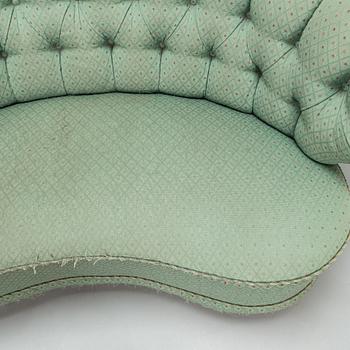 A mid-20th-century sofa.