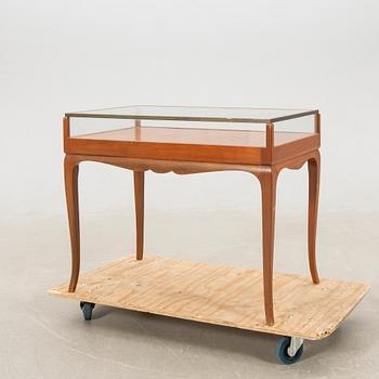 Display table Rococo style, first half of the 20th century.