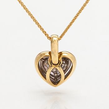 An 18K gold necklace with a heart shaped pendnat with diamonds ca. 0.09 ct in total.