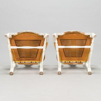 A pair of Rococo style armchairs, a pair of chairs, and a table, mid 20th century.