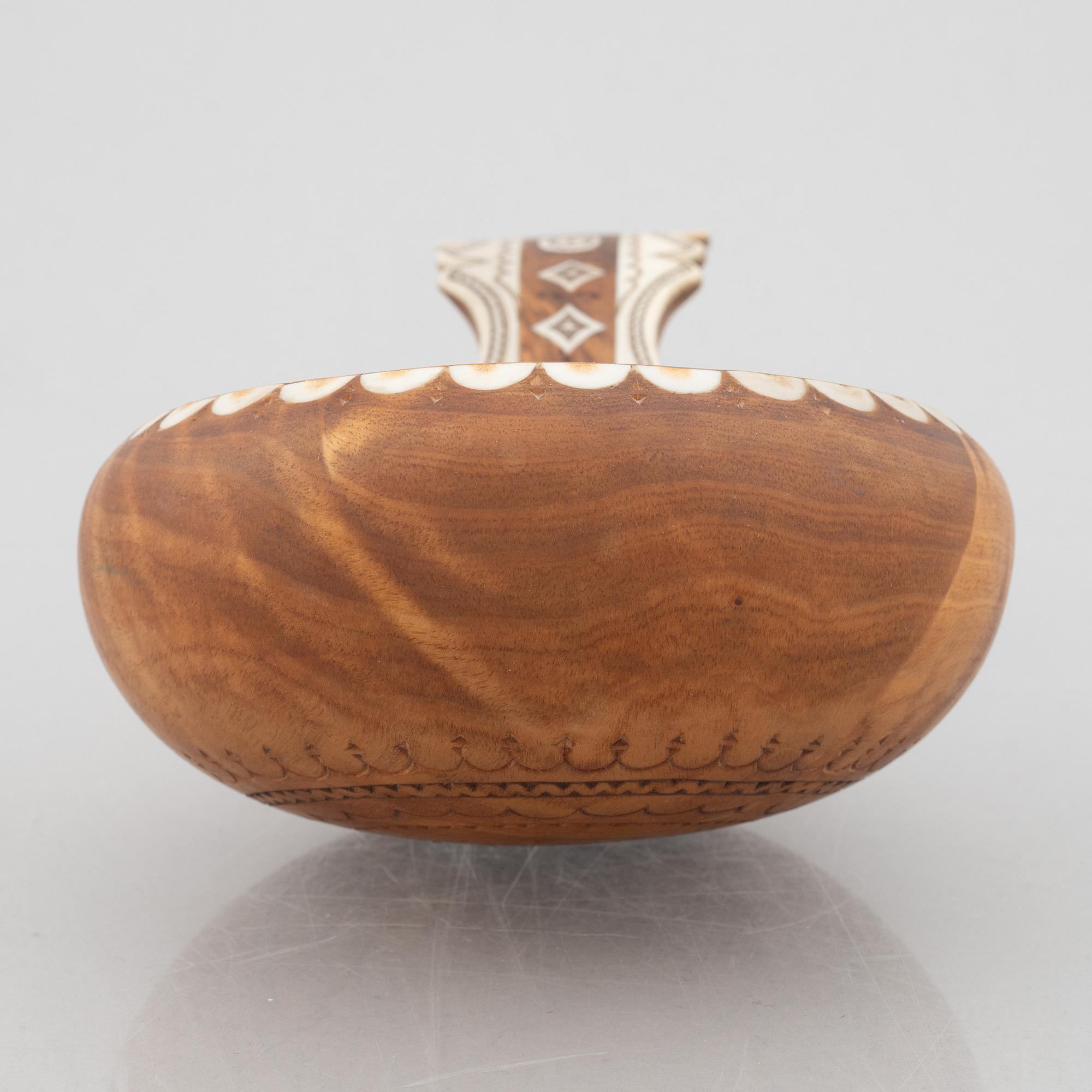 Lars Levi Sunna, a birch an reindeer horn cup signed.