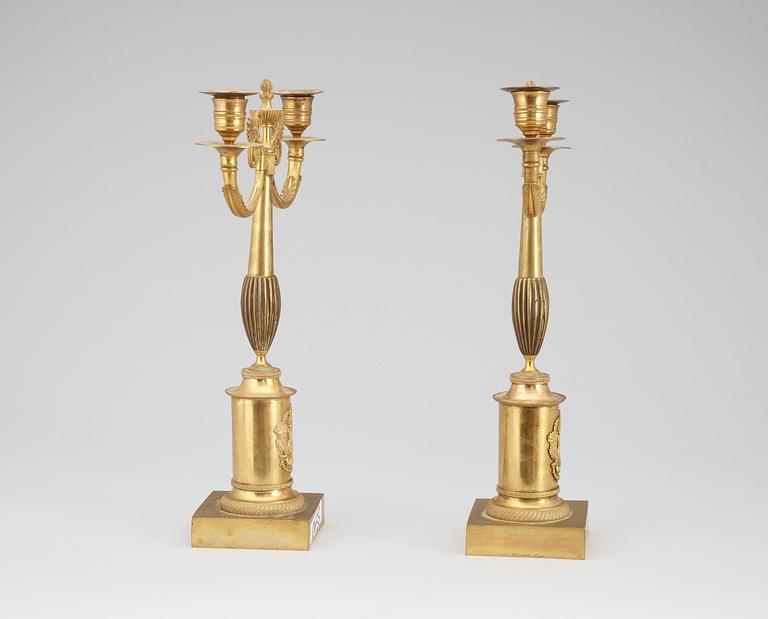 A pair of Swedish Empire 19th century gilt bronze two-light candelabra.