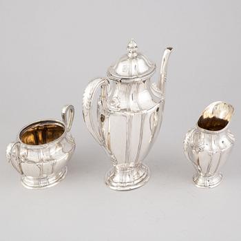 A three piece rococo style silver coffee service by John Victorin, Varberg, 1920.