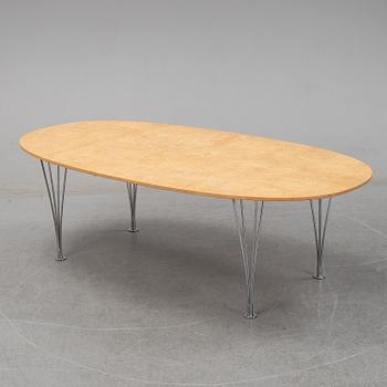 A 'Super-elliptical' birch coffee table by Piet Hein & Bruno Mathsson for Fritz Hansen.