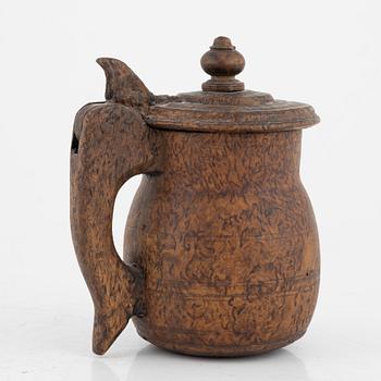 A birch tankard, dated 1830.