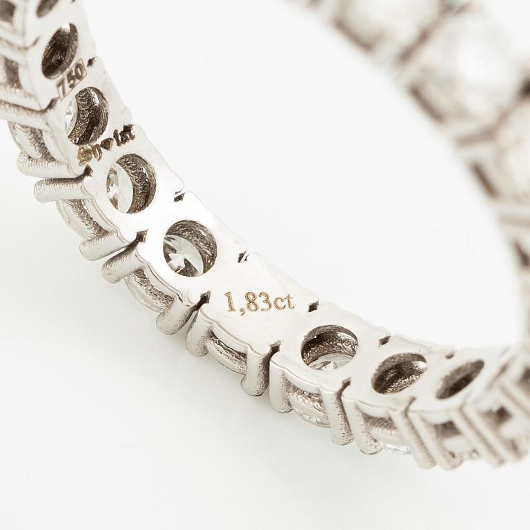 Full eternity ring in 18K white gold set with brilliant-cut diamonds.