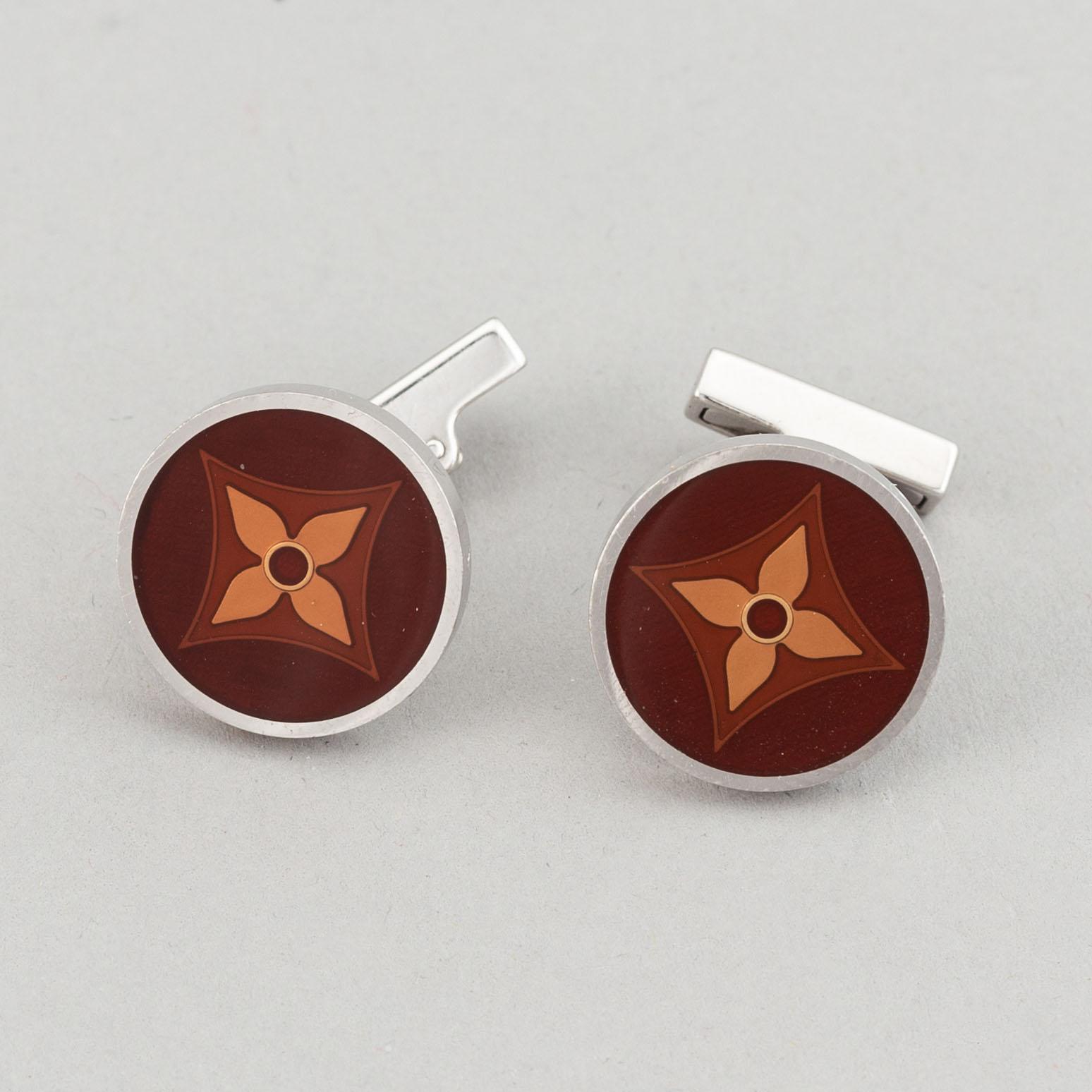 Louis Vuitton and Giorgio Armani, two pairs of cufflinks.