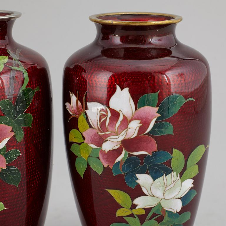 A pair of Japanese enamelled vases, Meiji (1868-1912).