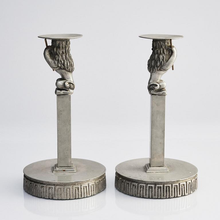 Anna Petrus, a pair of pewter and brass candlesticks, Herman Bergman's foundry, Stockholm, Swedish Grace, early 1920s.