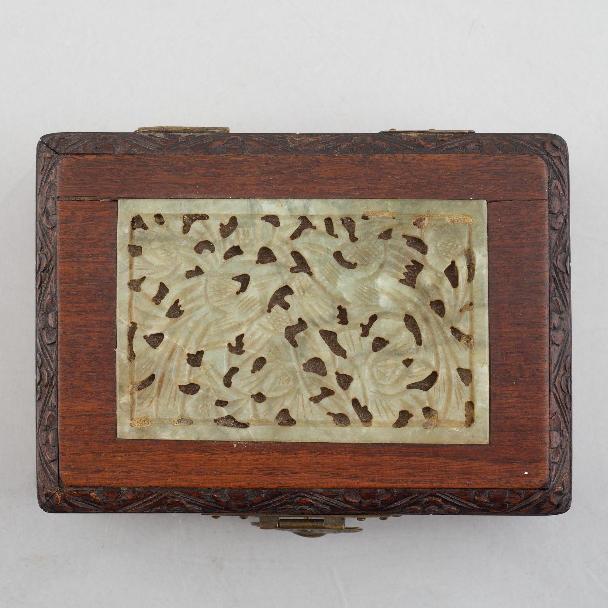 Two Chinese hardwood boxes with nephrite plaques, 20th century.