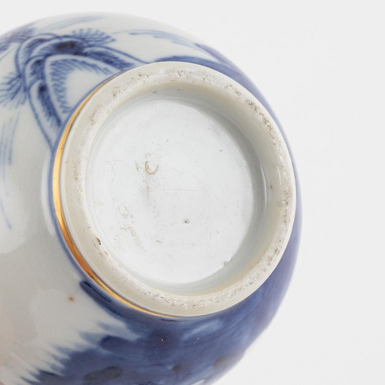 A small Chinese export tureen with cover, two cups, a saucer and a jug with cover, Qing dynasty, 18th century.