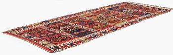 An antique southeast Anatolian kilim, c. 412 x 163 cm.