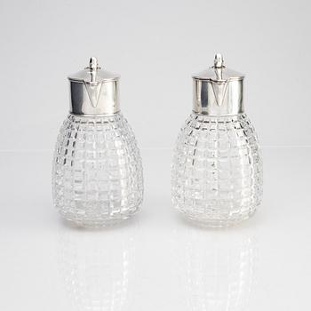 A pair of parcel-gilt silver and "hobnail" crystal decanters, W.A. Bolin, Stockholm 1920.