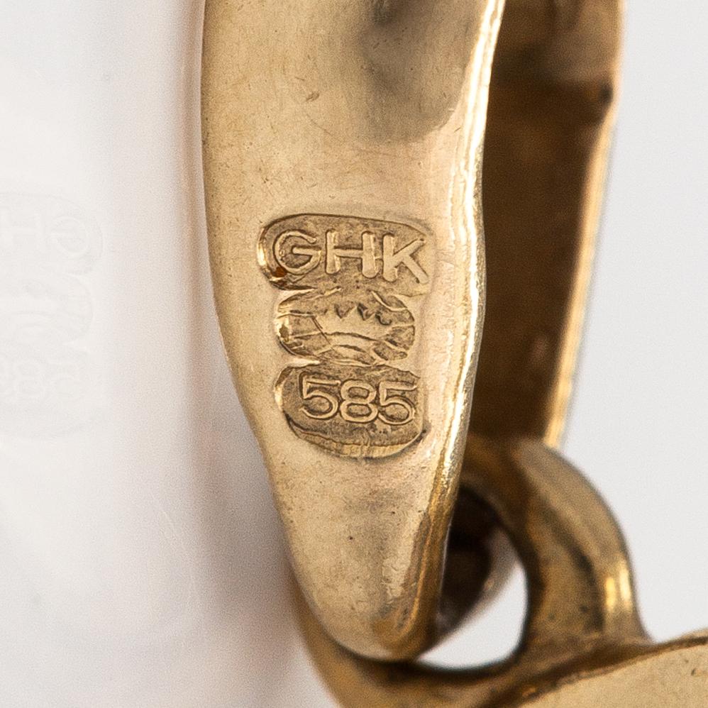 Hänge, 14K guld, diamanter 0.12 ct tot enl gravyr.