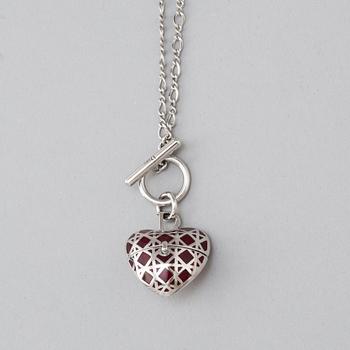 A Christian Dior costume jewelry pendant.