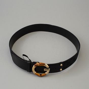 GUCCI, a leather and canvas belt, size 80/32.