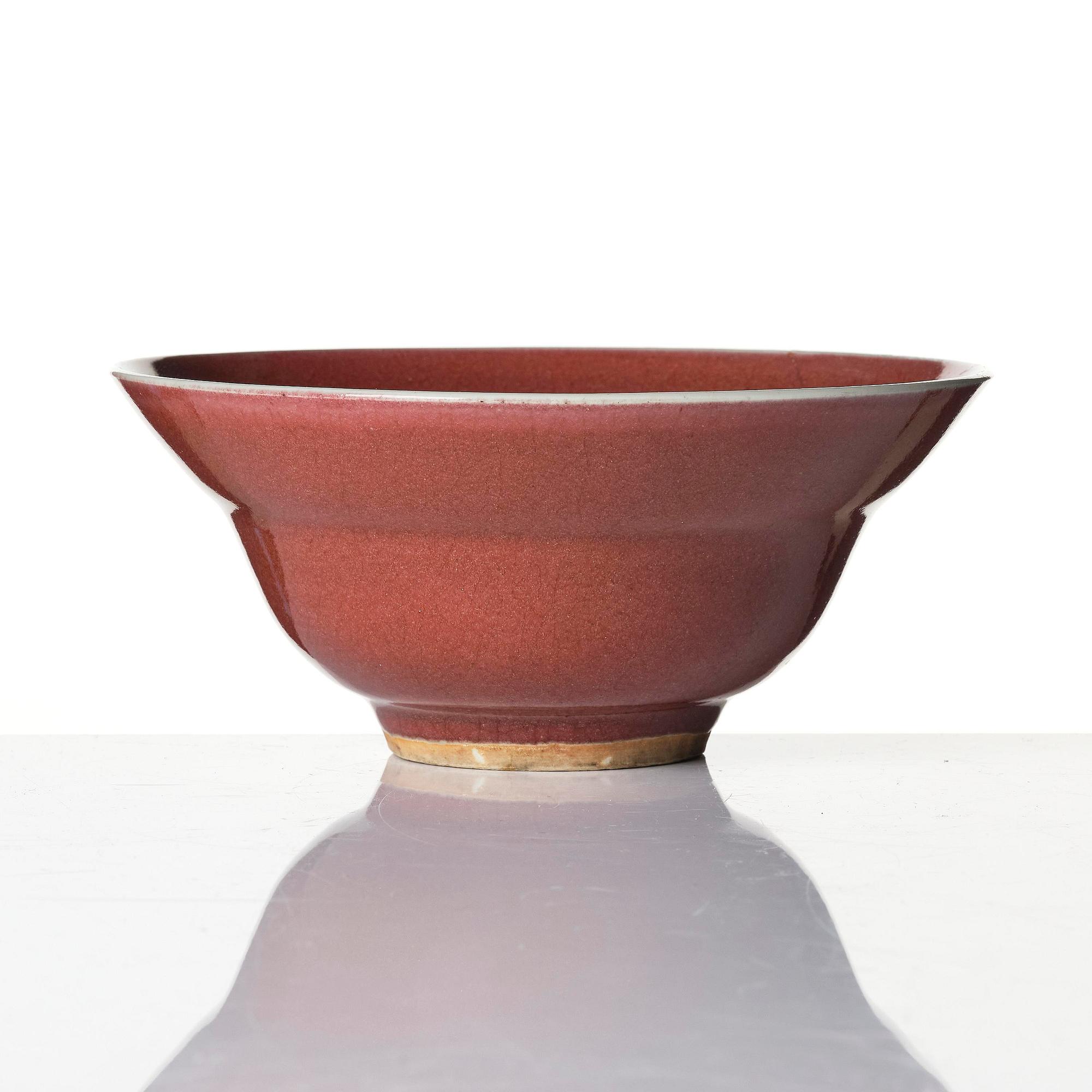 A red glazed bowl, Qing dynasty, 18th century.