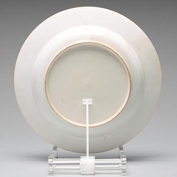 A set of eight blue and white armorial soup dishes, Qing dynasty, 18th Century.