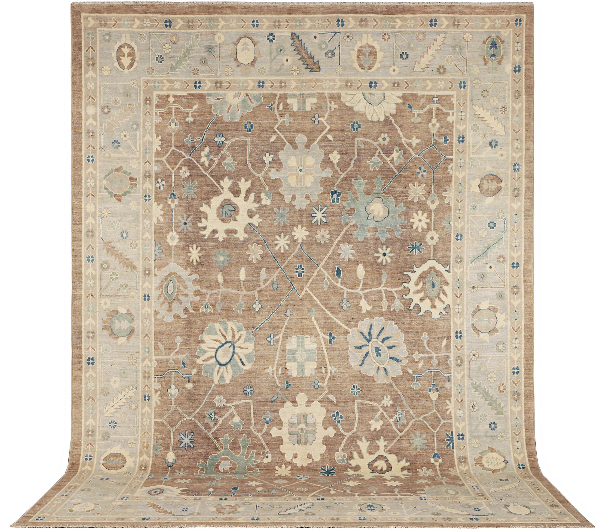 An Ushak design carpet, a. 423 x 305 cm.