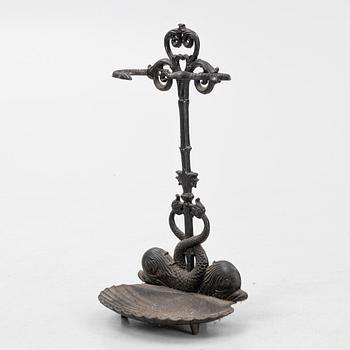 A cast iron umbrella stand, early 20th century.