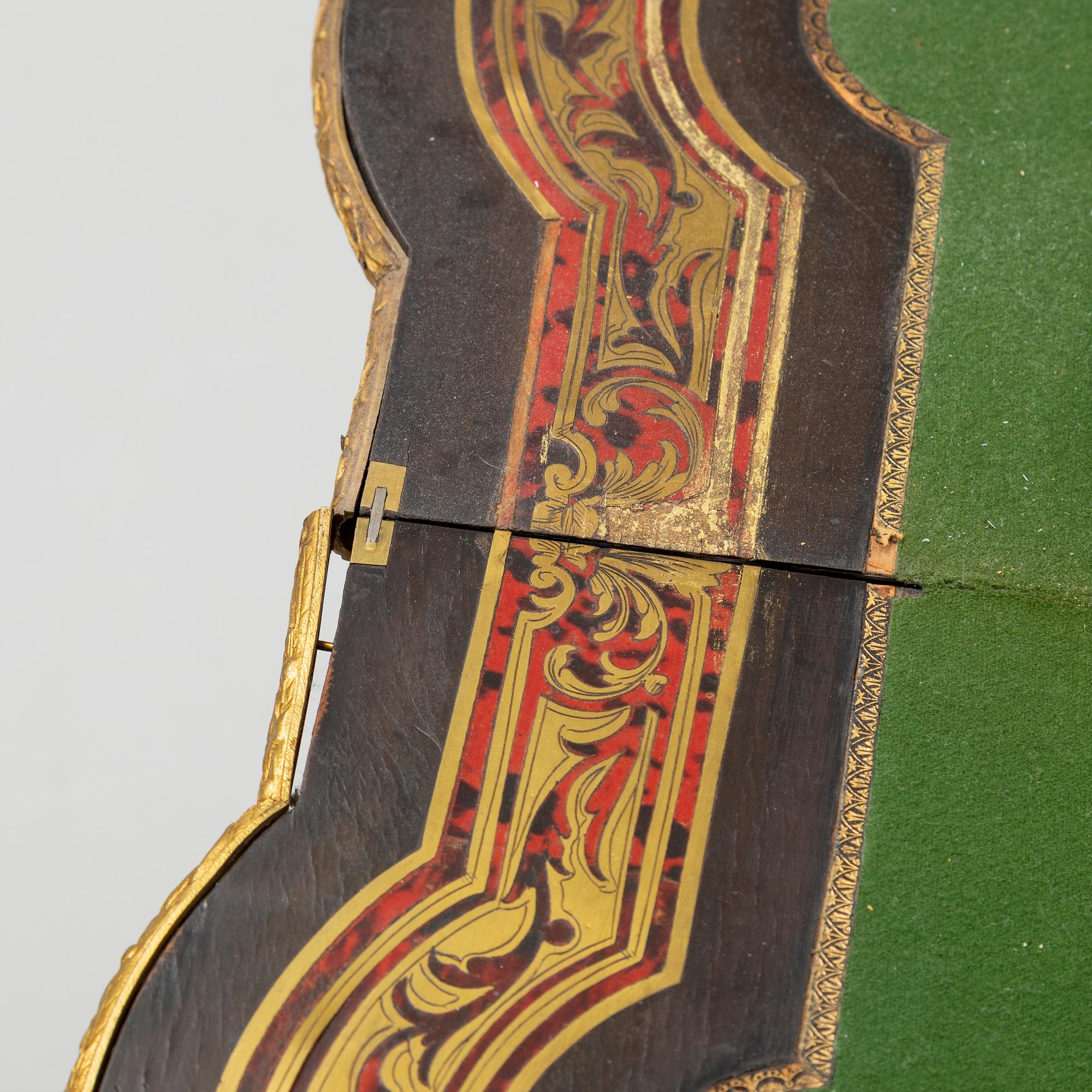 A Boulle style card table, end of the 19th Century.