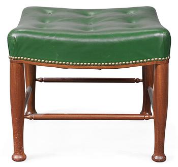 A Josef Frank green leather and mahogany stool, Firma Svenskt Tenn.