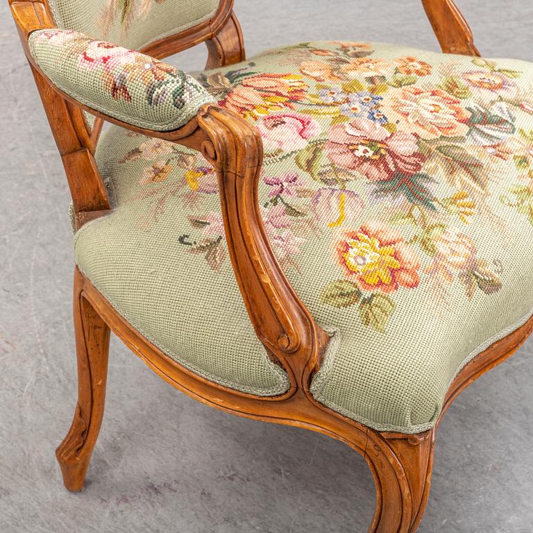A pair of French 18th century Louis XV armchairs.