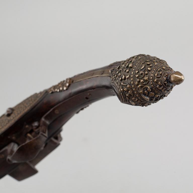 A mid 19th century miquelet lock pistol.