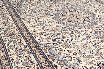 A CARPET, Nain part silk, s.k 9 LAA, 588 x 393 cm.