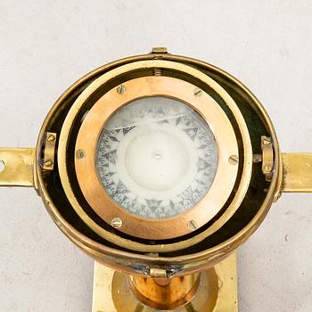 An 19th/20th century brass binnacle.