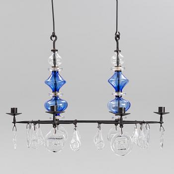 Erik Höglund, a wrought iron and glass chandelier, second half of the 20th century.