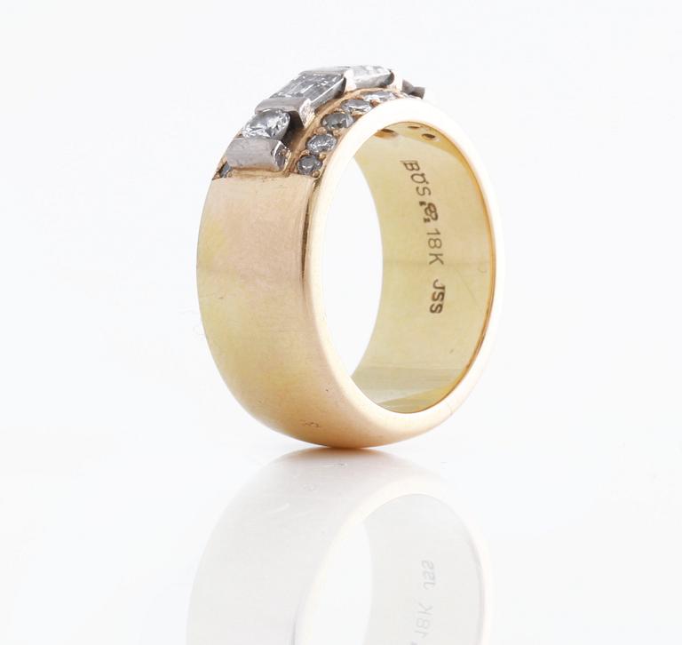 A ca 0.60 - 0.70 cts brilliant and baguette cut diamond ring by Bror Schalin, Östersund.