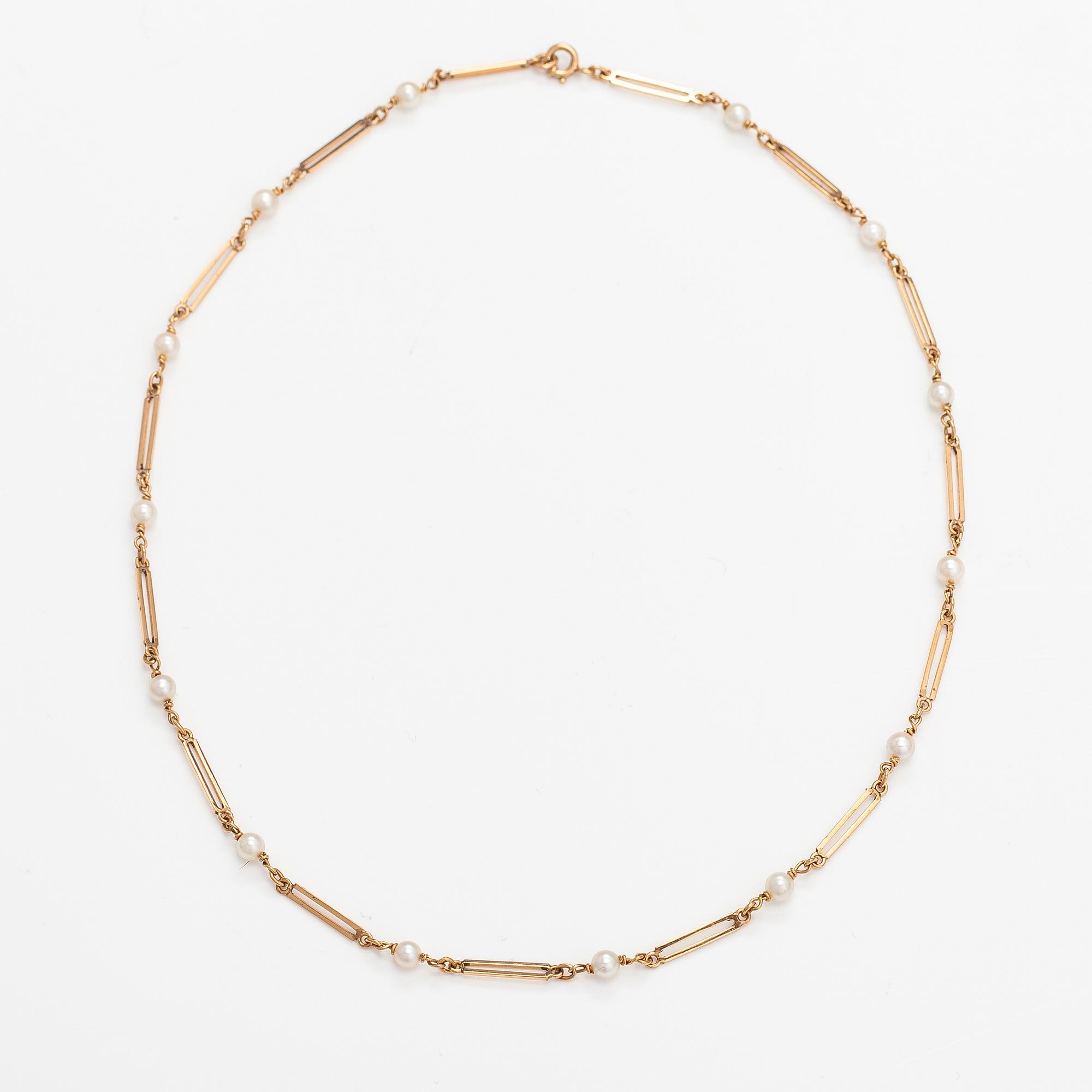 A 14K gold necklace with cuktured pearls. Westerback, Helsinki 1965.