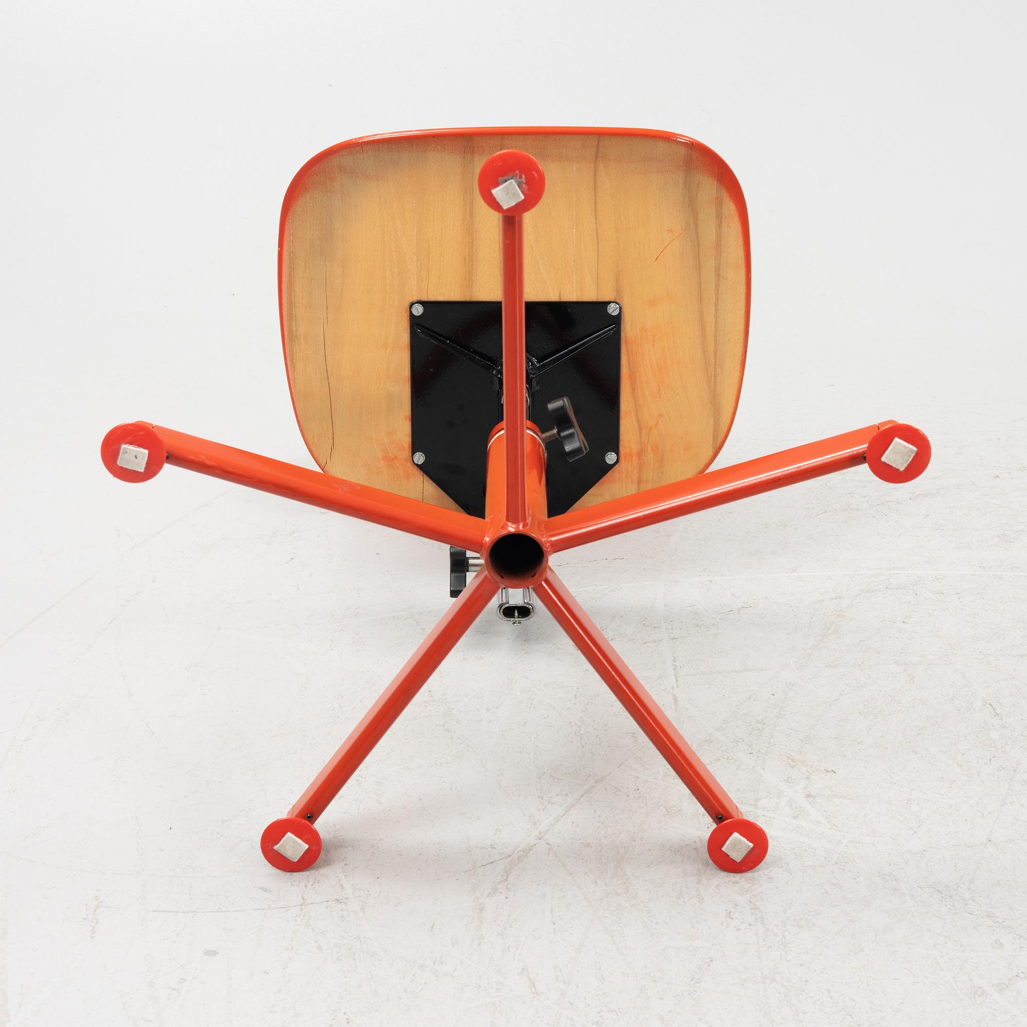 A red desk chair, 1970's.