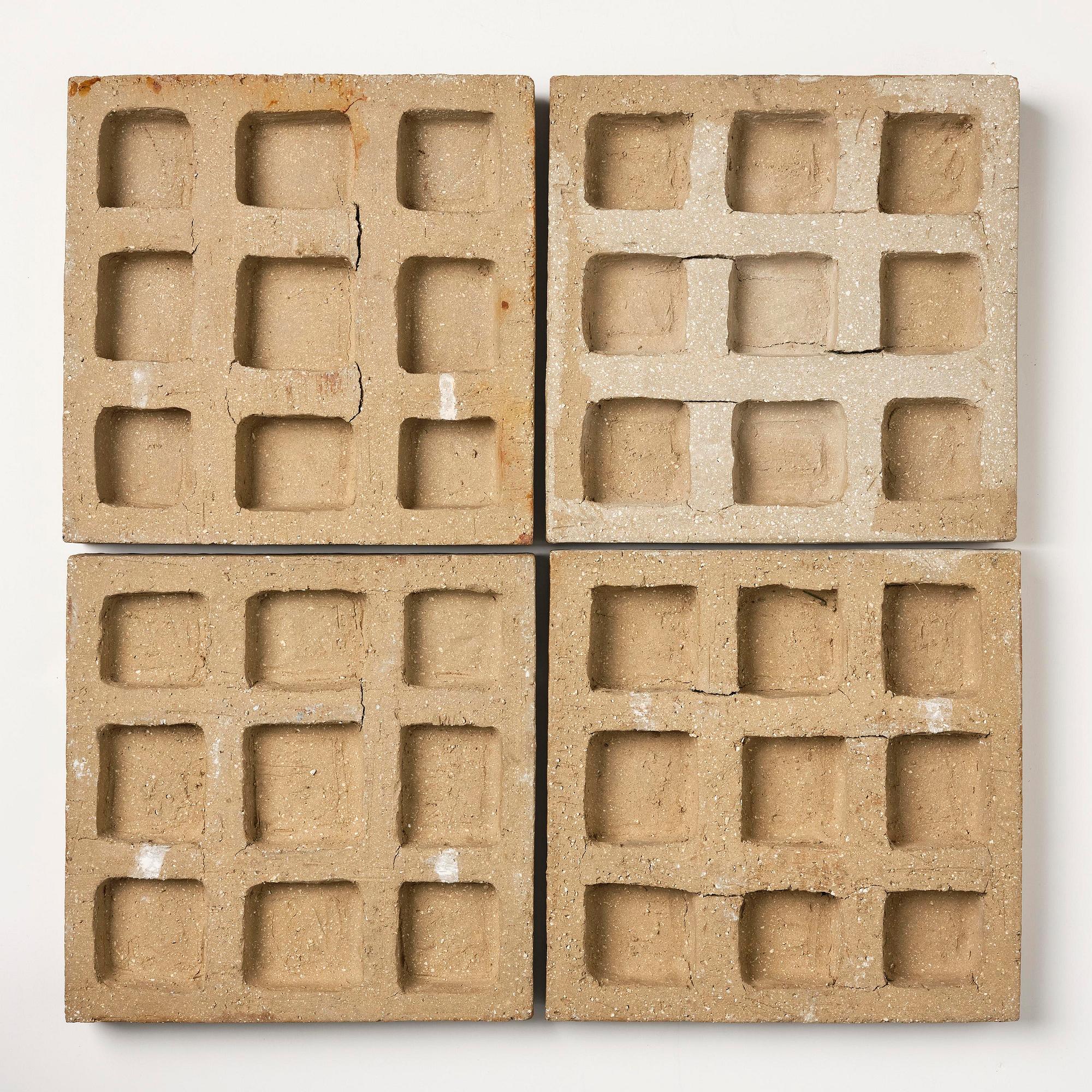 Stig Lindberg, a chamotte stoneware relief, four pieces, Gustavsberg Studio 1940s.