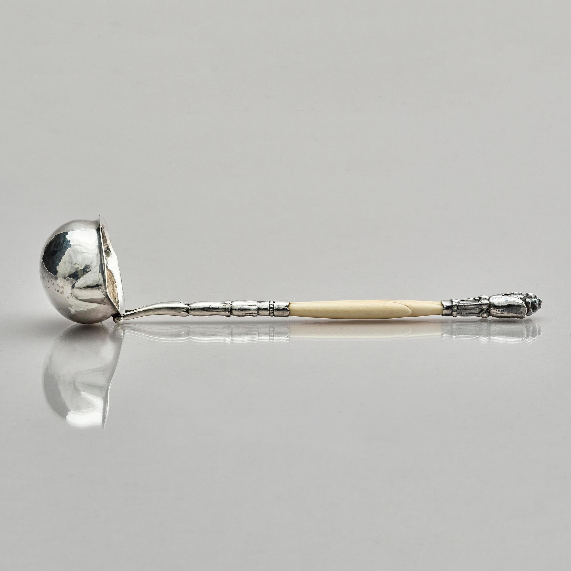 Georg Jensen, a sterling silver and ivory gravy ladle, model no 93, Copenhagen, Denmark 1924.
