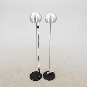 A pair of Heimi steel 1970s floor lamps.