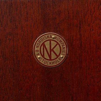 Nordiska Kompaniet, a Swedish Modern mahogany and stained beech cabinet, 1938.