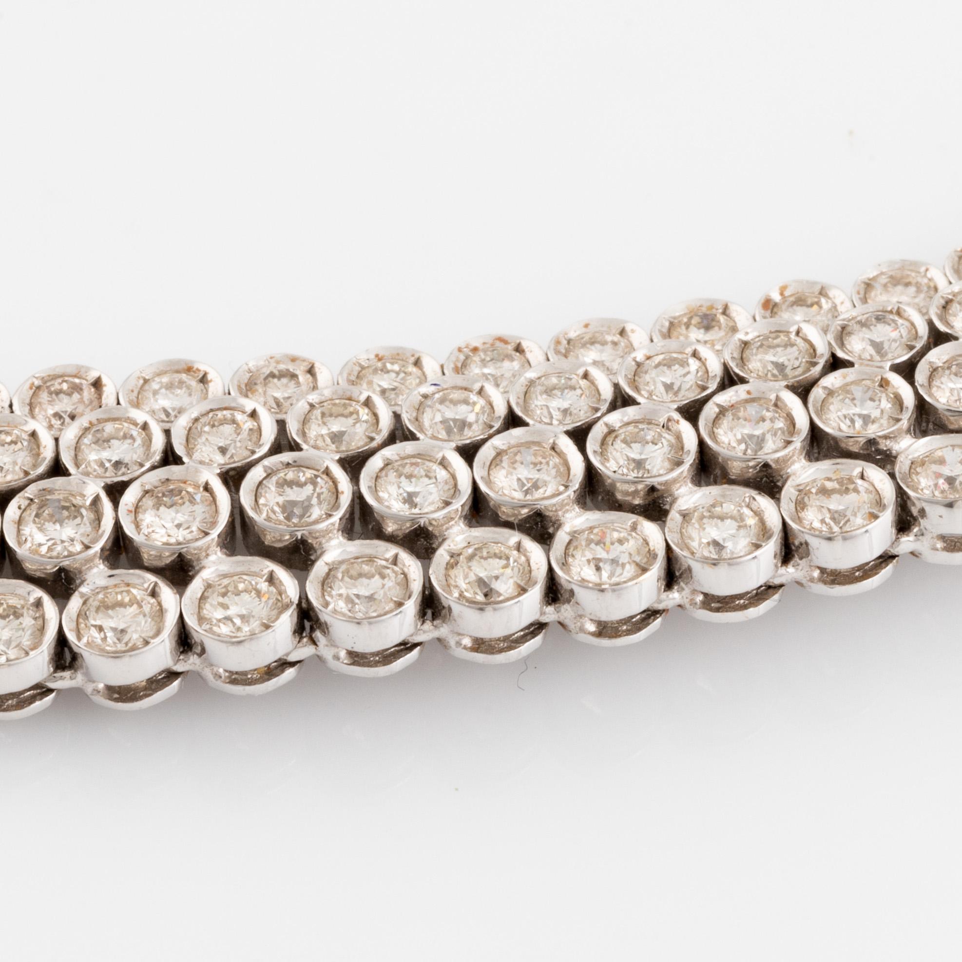 White gold and brilliant cut diamond necklace.