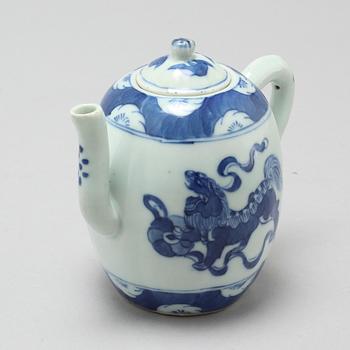 A 20th century porcelain tea pot.