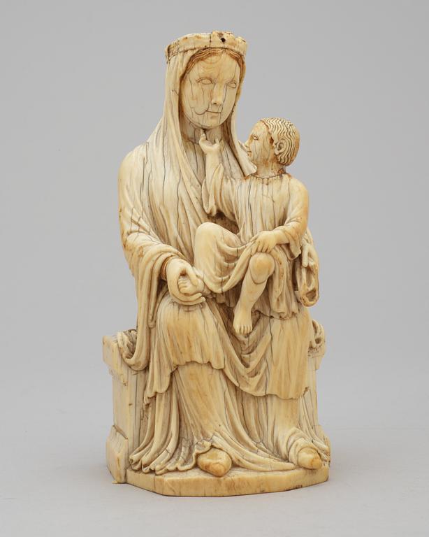 Virgin and Child, a French Gothic ivory statuette, second half of the 13th century.