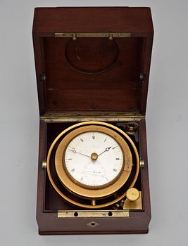 An 1830's Marine Chronometer, Henri Motel, Horologer de la marine, Nr 164. Mahogny and brass-mounted.