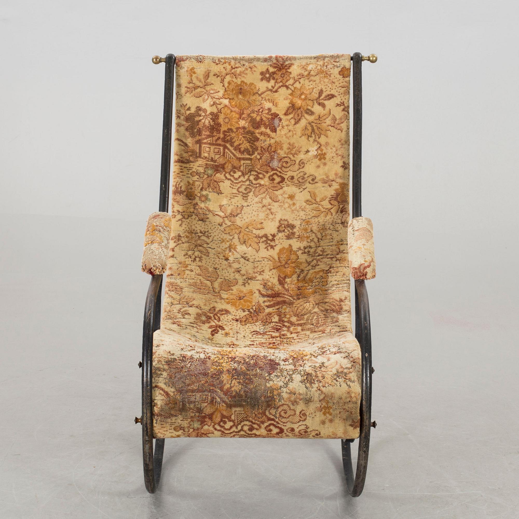 A IRON ROCKING CHAIR BY ROBERT W WINFIELD 19TH CENTURY.