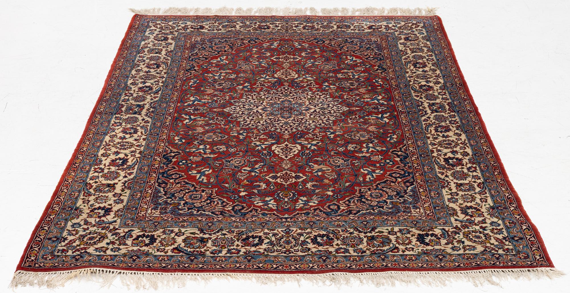 An Isfahan rug, c. 225 x 150 cm.