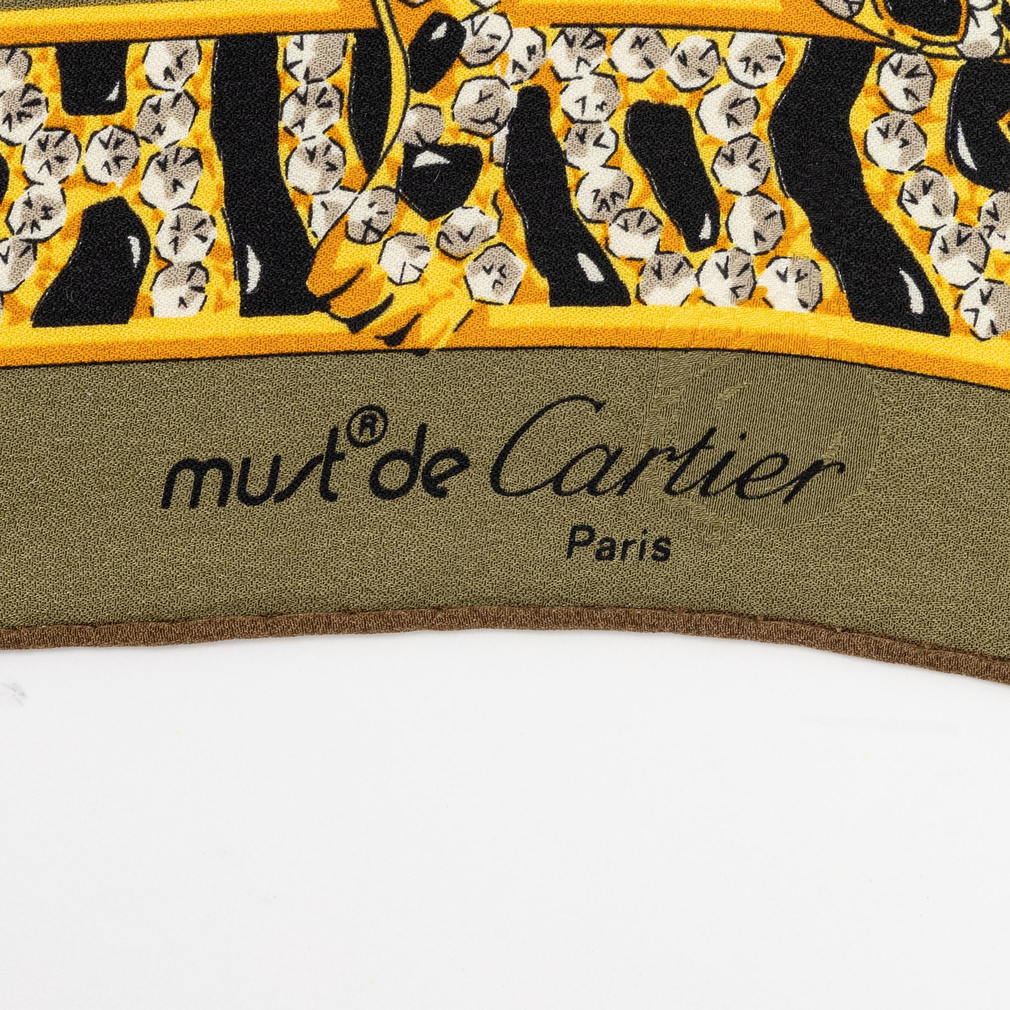 Cartier, a jaquard silk scarf.