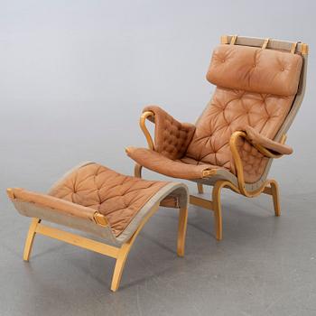 BRUNO MATHSSON, "Pernilla" armchair and stool from DUX.