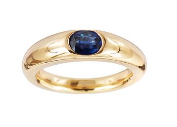 518. A gold and blue sapphire ring, 0.65 cts.