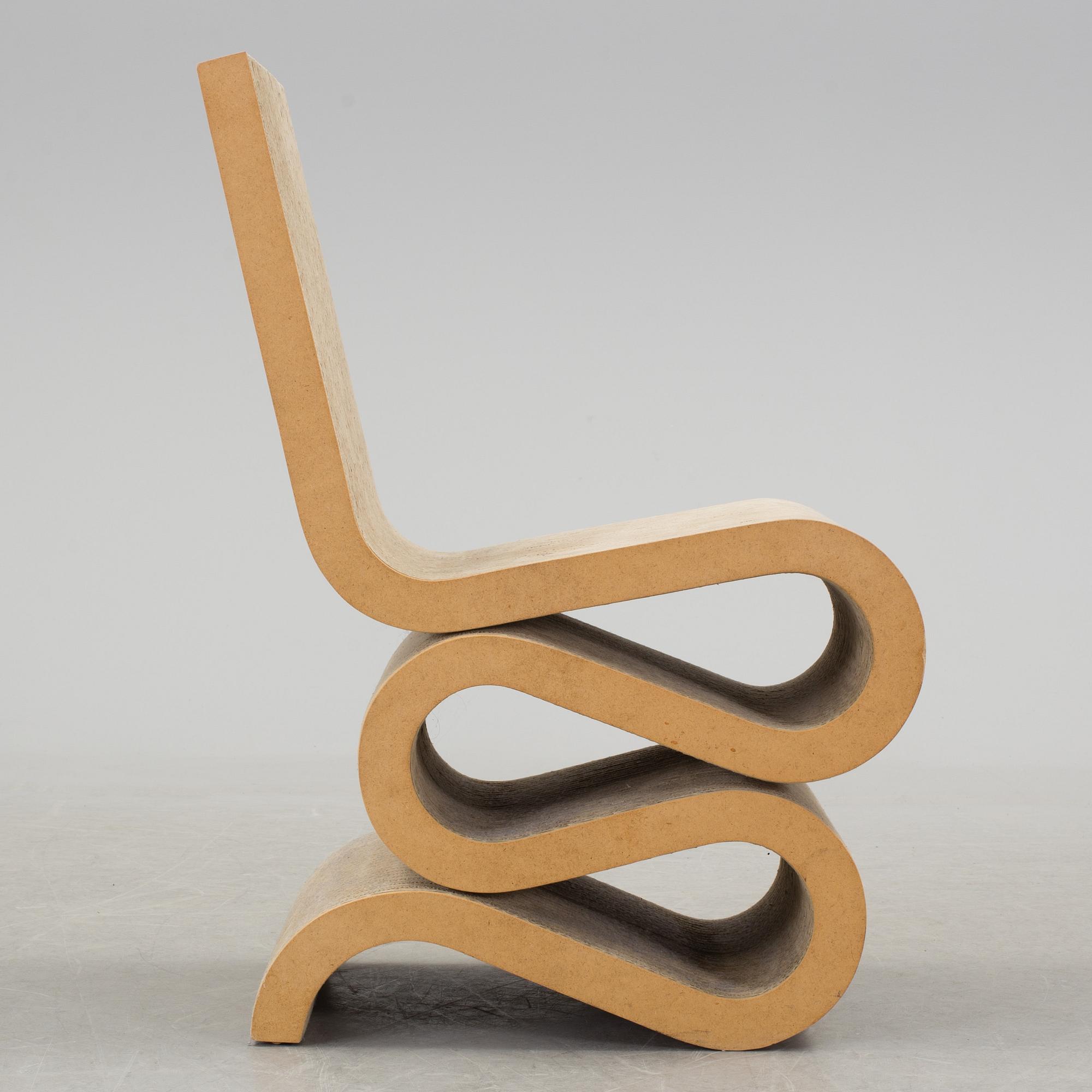 A 21 th century Frank O. Gehry "Wiggle Side Chair" for Vitra, Germany.