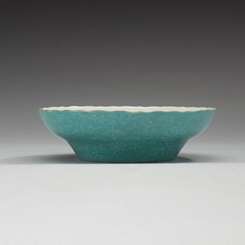 A turquoise slip decorated bowl, Qing dynasty, with Daoguangs seal mark in red and period (1821-50).