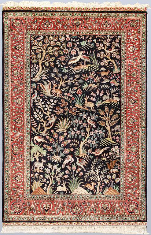 A Tabriz silk rug, approx. 155 x 100 cm.